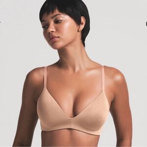 2 SKIMS wireless t-shirt bras